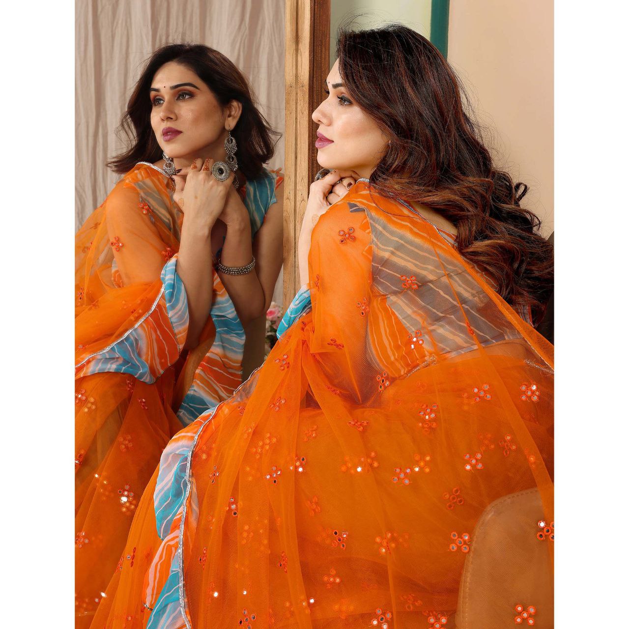 New Orange Color Mirror Work Embroidered Net Ruffle Saree With Unstiched Blouse